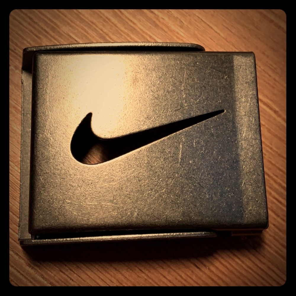 Nike belt buckle with built in bottle opener.
